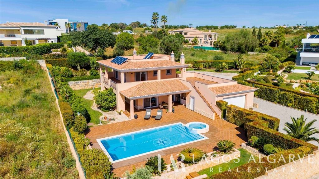 Property photo 1 of 41 Exquisite 4-Bedroom Villa In Exclusive Porto De Mós, Just A 10-Minute Walk To The Beach