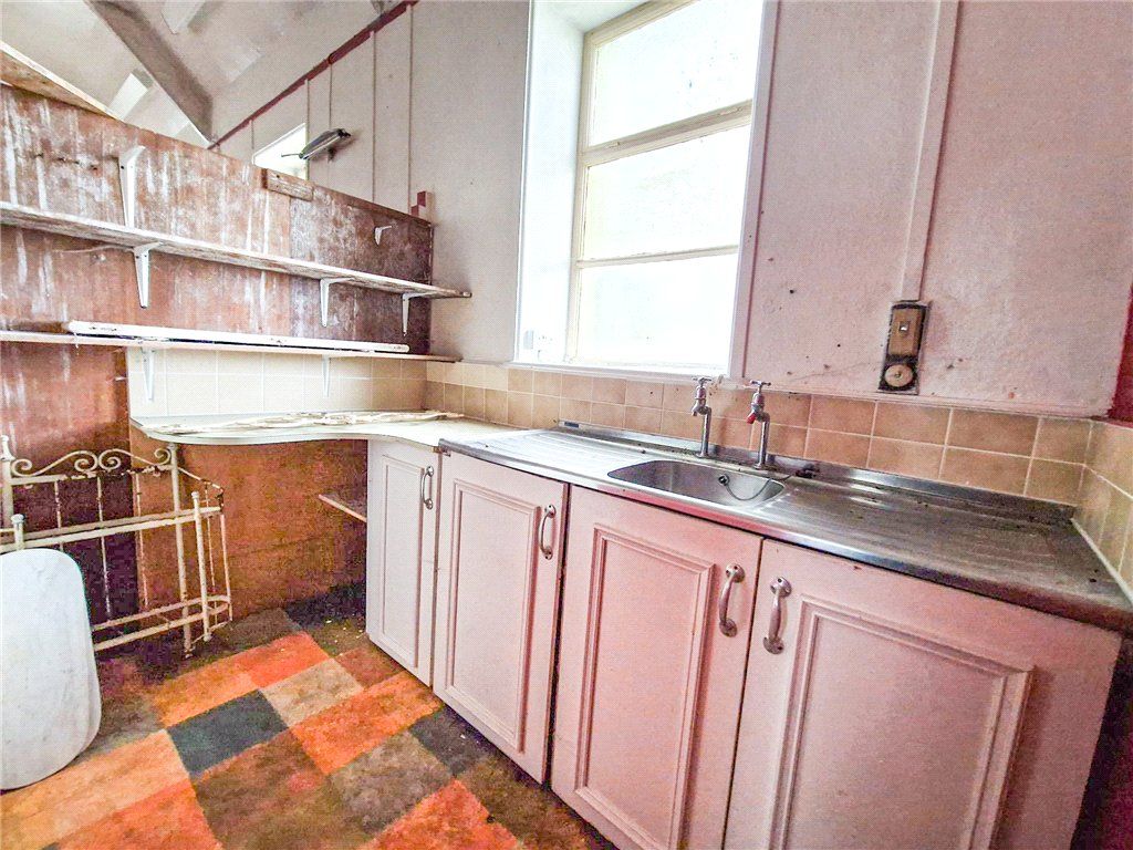 Property photo 3 of 9 Kitchen Area