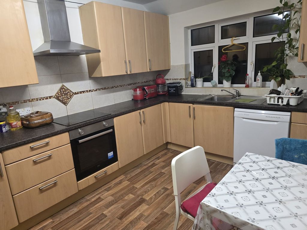 Property photo 2 of 10 Bright Kitchen With Ample Storage And Dining Space...