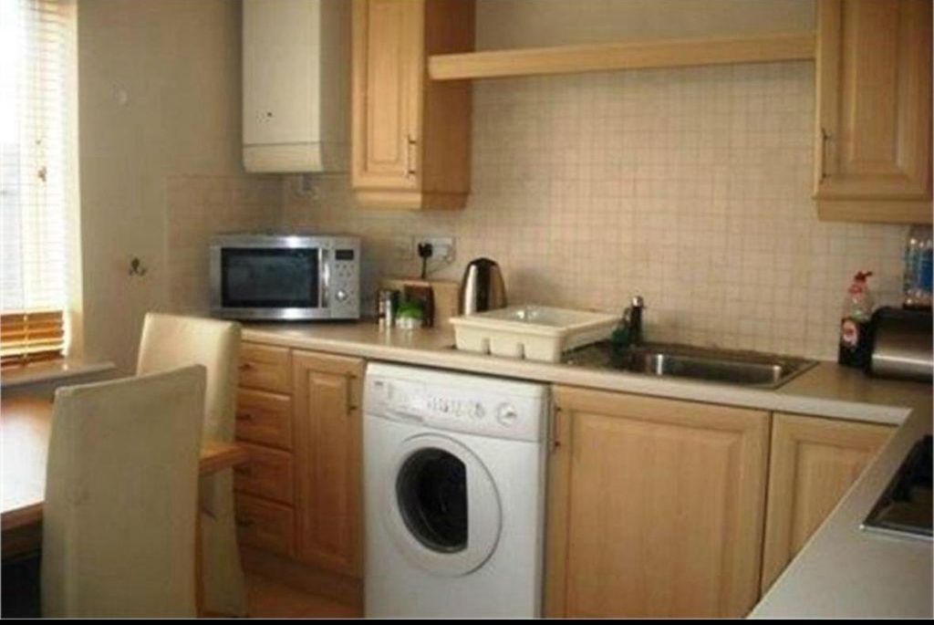 Property photo 3 of 7 Kitchen