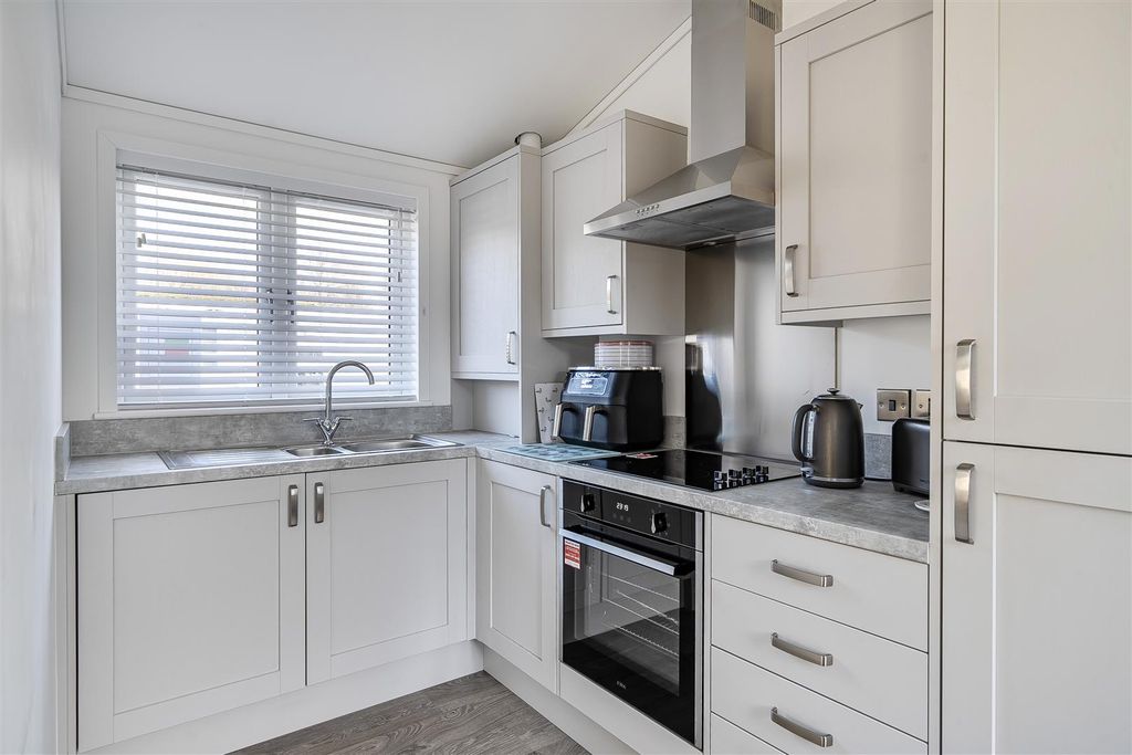 Property photo 3 of 25 Kitchen Area