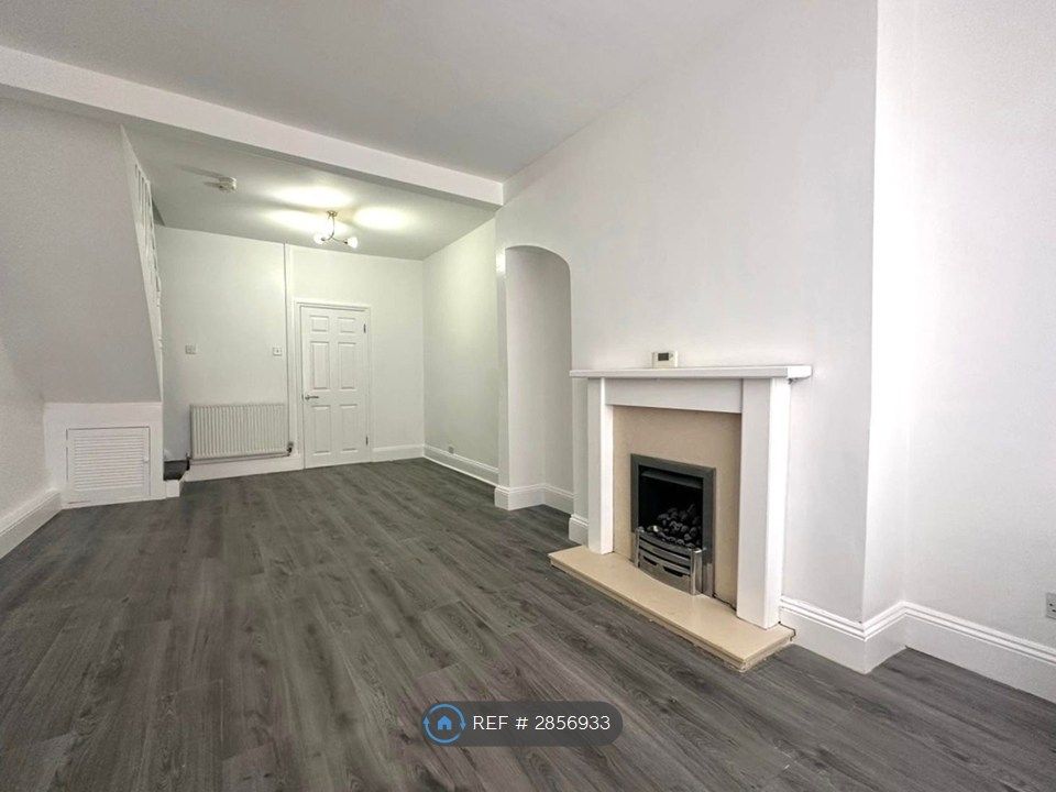 Property photo 2 of 11 Living Area