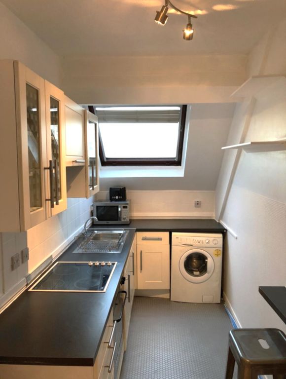 Property photo 3 of 8 Kitchen