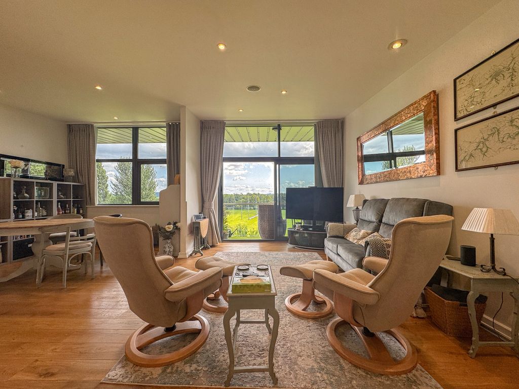 Property photo 3 of 18 Living Area