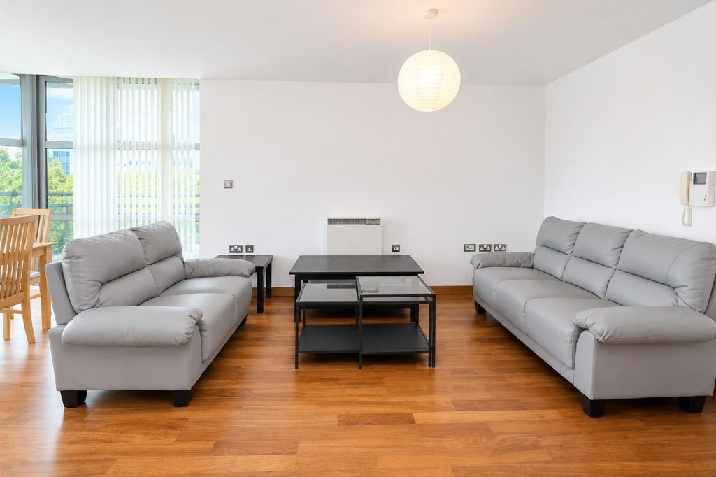 Property photo 2 of 12 Bright And Spacious Lounge With Comfy Sofas...