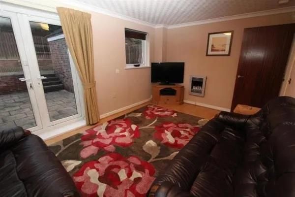 Property photo 2 of 10 Living Room: