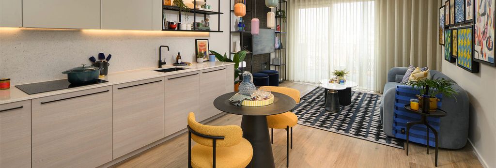 Property photo 1 of 5 Modern Designed And Decorated Living Room And Dining / Kitchen Area.