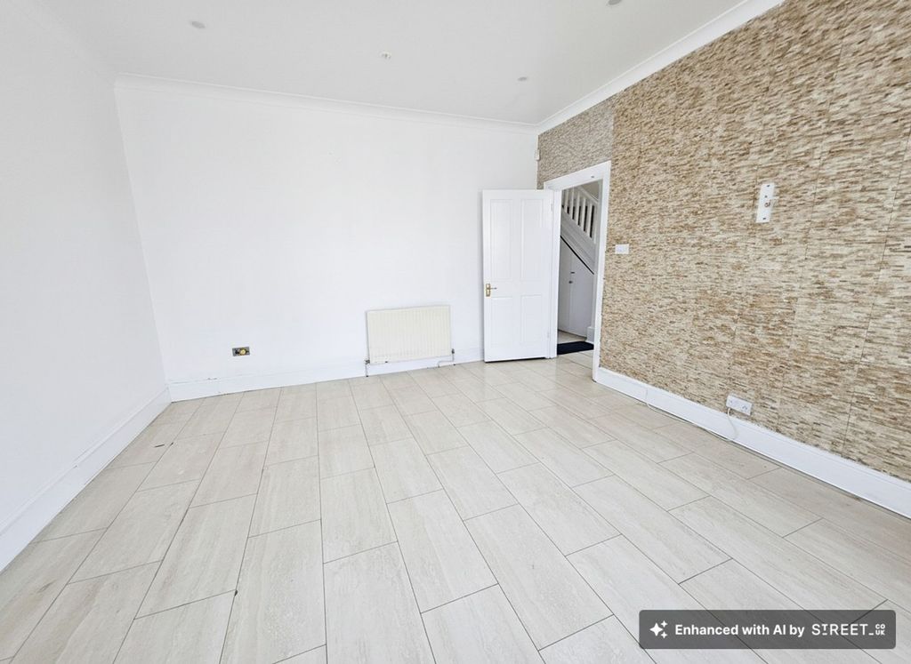 Property photo 3 of 11 Front Living Room