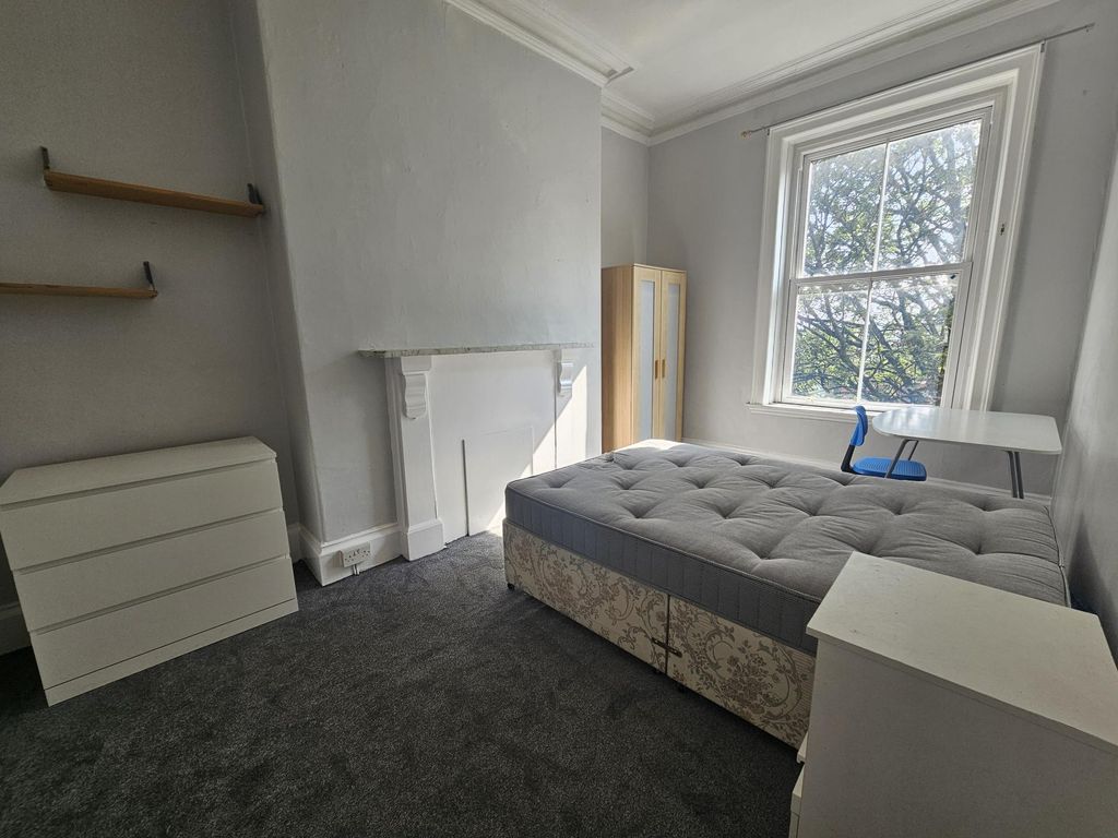 Property photo 1 of 12 A Cozy Bedroom Featuring A Comfortable Double Bed ...