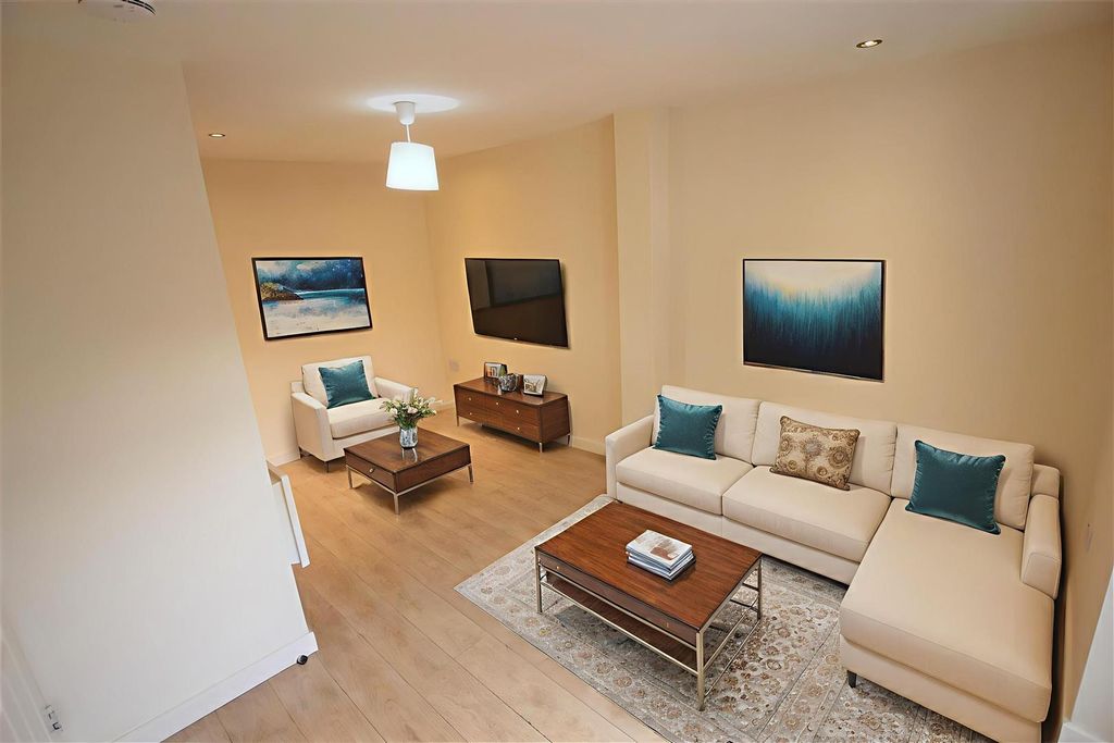 Property photo 2 of 8 Staged Living Room