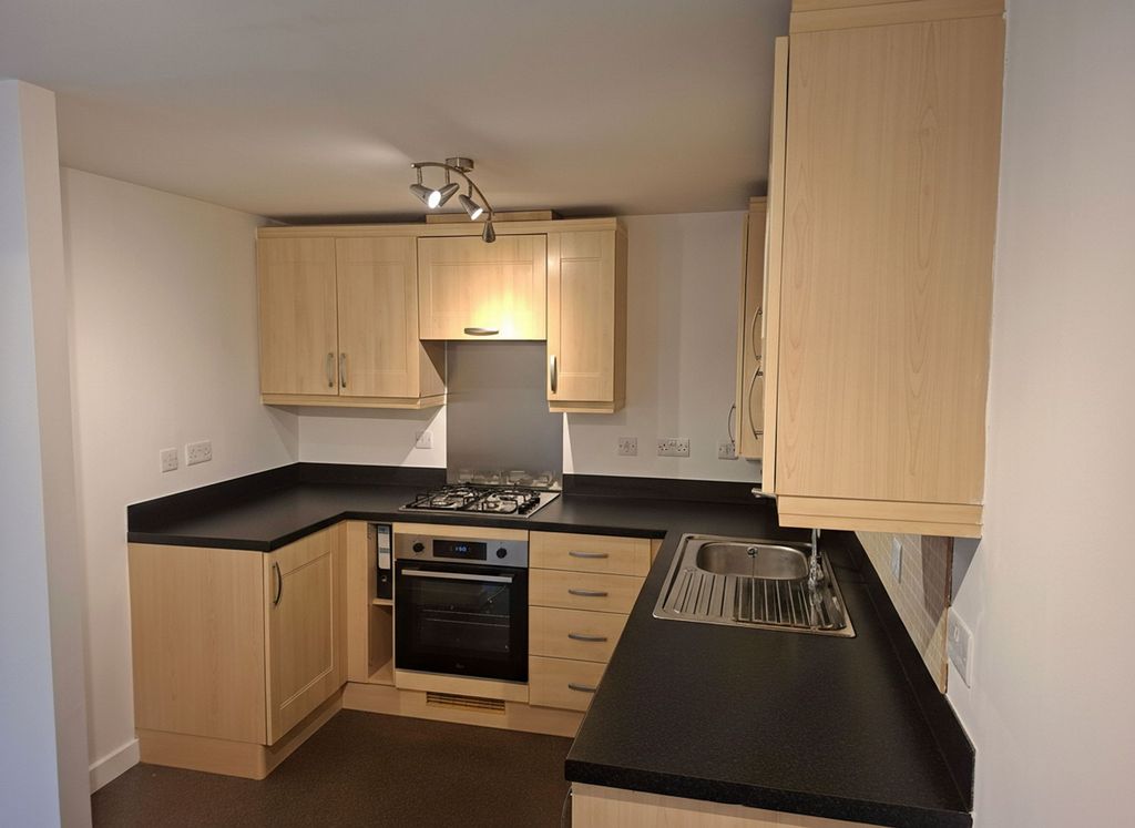 Property photo 3 of 16 Kitchen