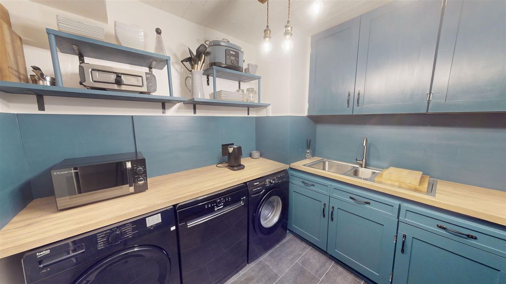 Property photo 3 of 13 Kitchen