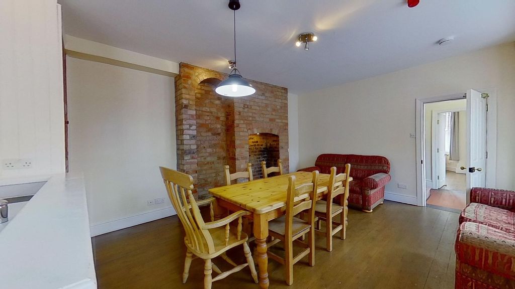 Property photo 2 of 11 Bright Shared Living And Dining Area With A Large ...