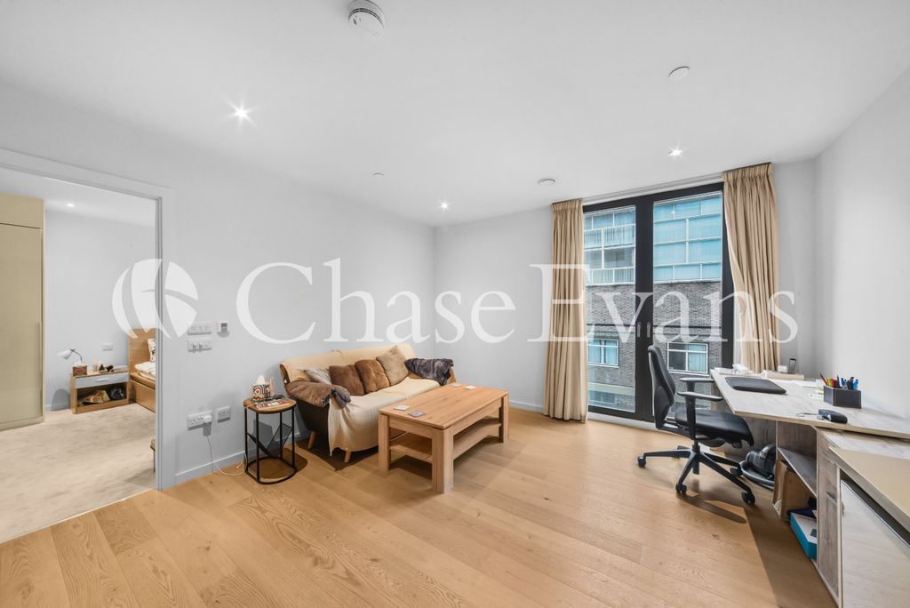 Property photo 2 of 12 Living Area