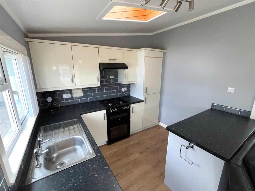 Property photo 2 of 19 Kitchen