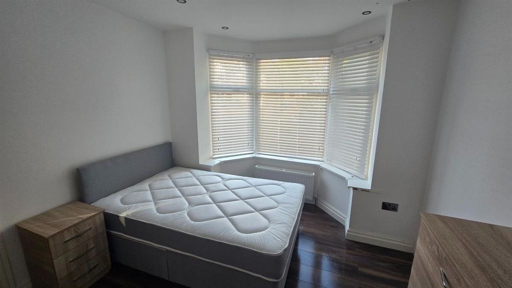 Property photo 3 of 10 A Bright And Tidy Bedroom Featuring A Comfortable ...