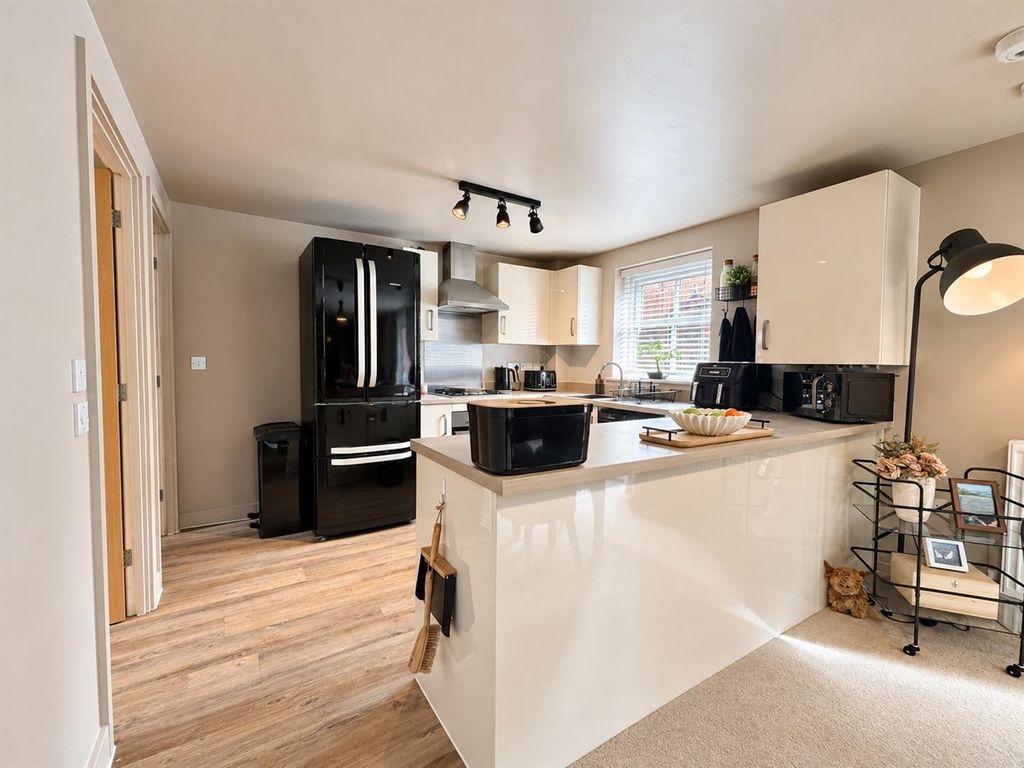 Property photo 2 of 14 Kitchen Area