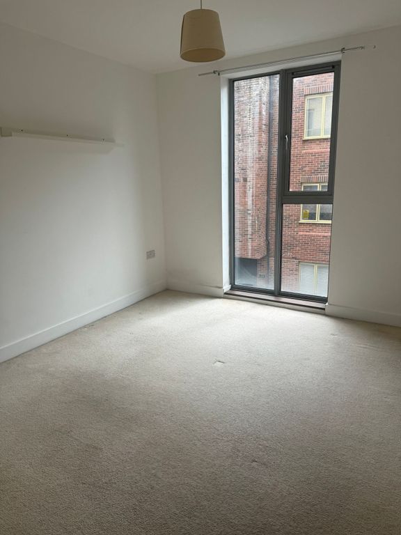 Property photo 1 of 5 Bright Room With Tall Window And Neutral Carpet...
