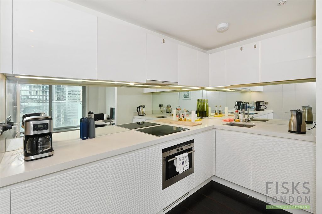 Property photo 2 of 8 1405-Pan-Peninsula Kitchen.Jpg
