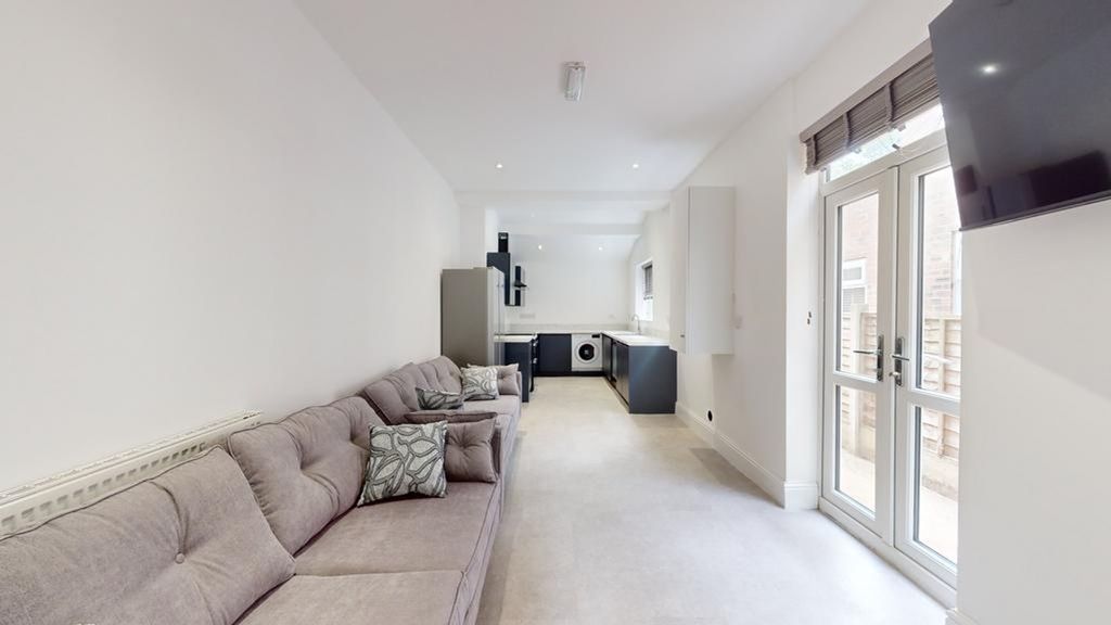 Property photo 2 of 12 A Spacious And Modern Living Room, Perfect For Soc...