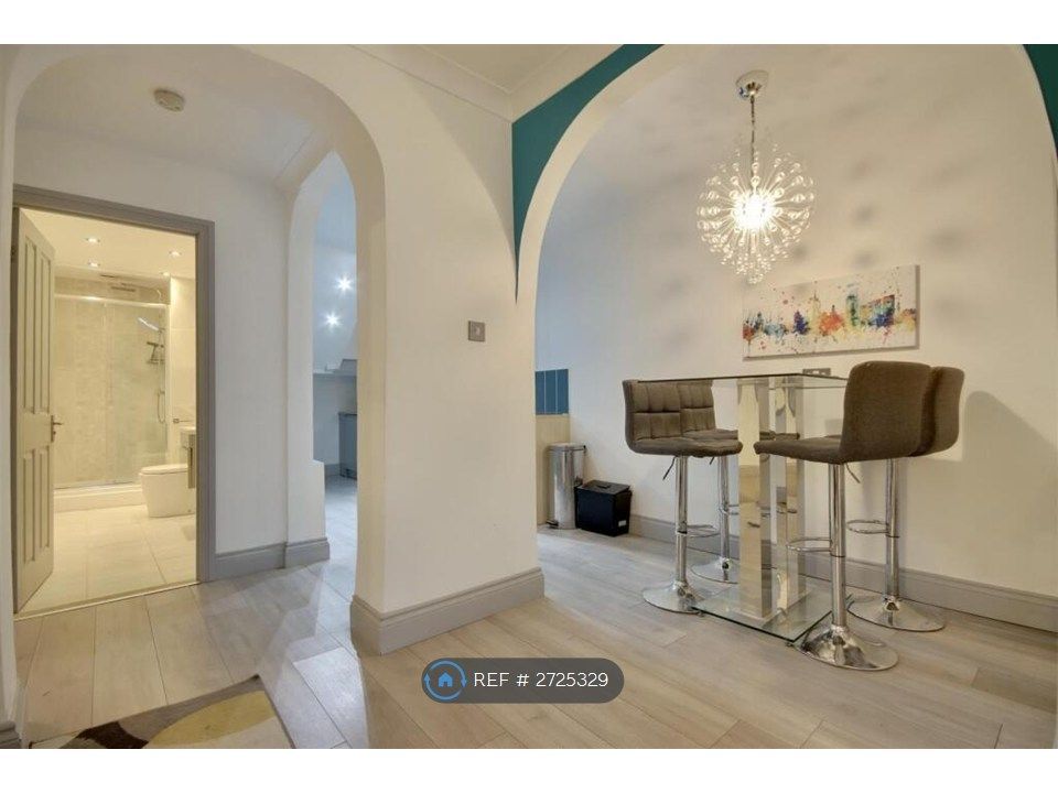 Property photo 2 of 11 Bathroom And Dining Space