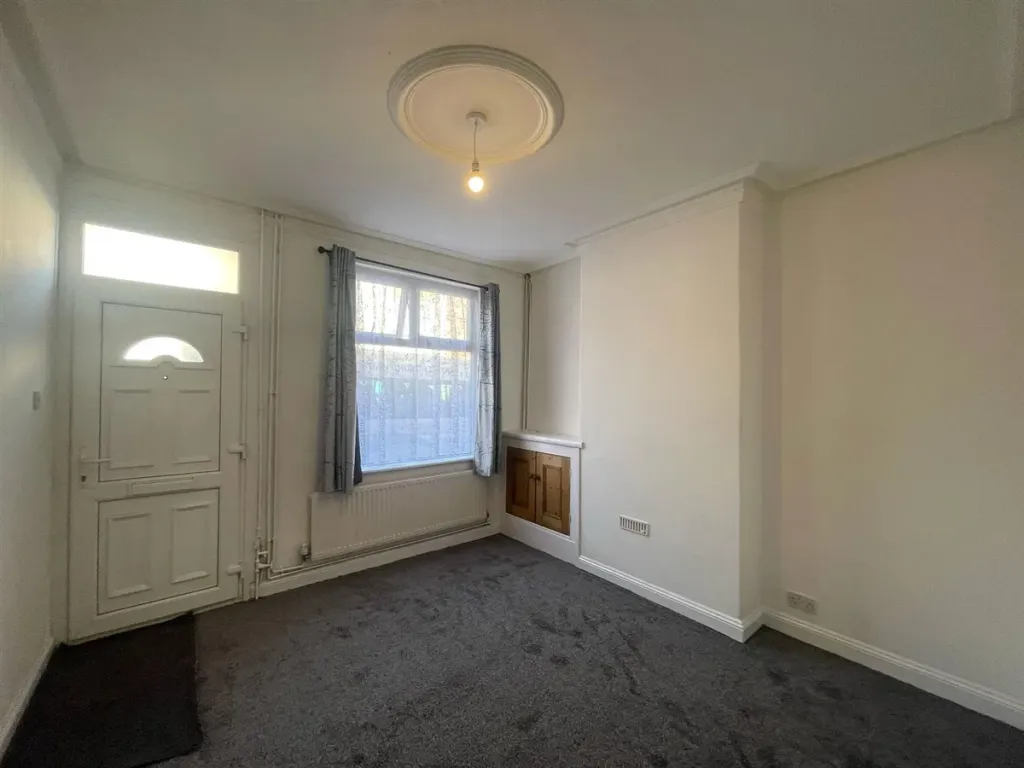 Property photo 2 of 8 Living Room 