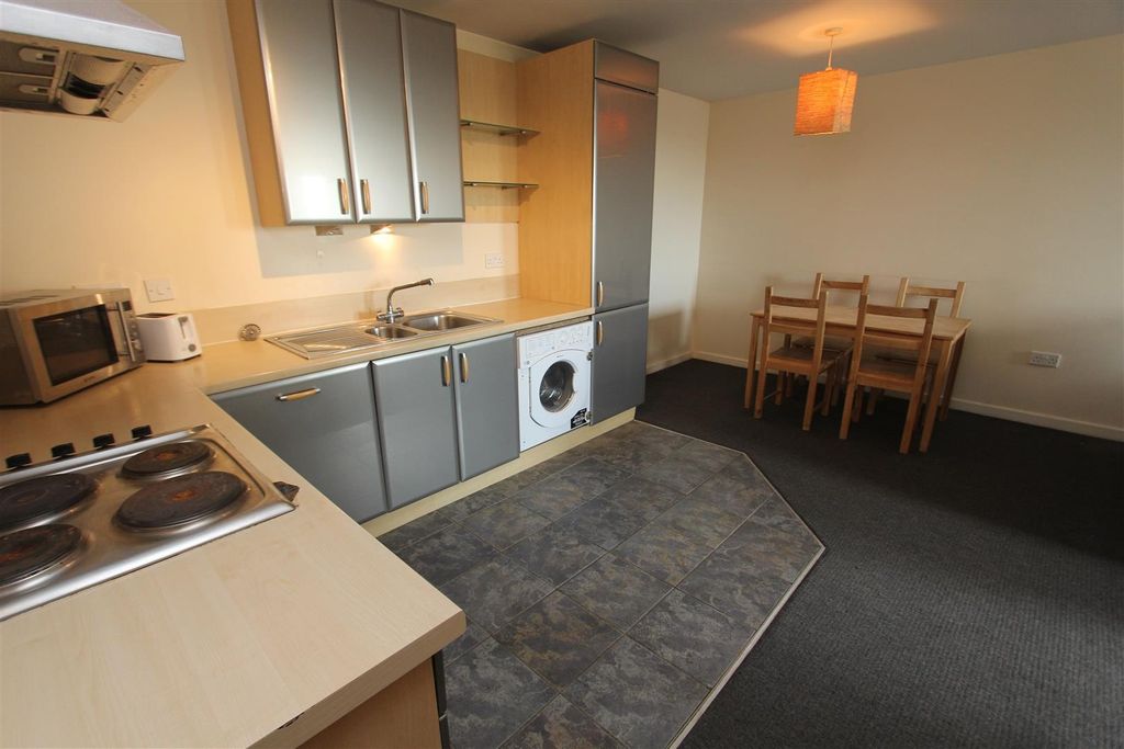 Property photo 2 of 12 Sleek Modern Kitchen With Dining Space...