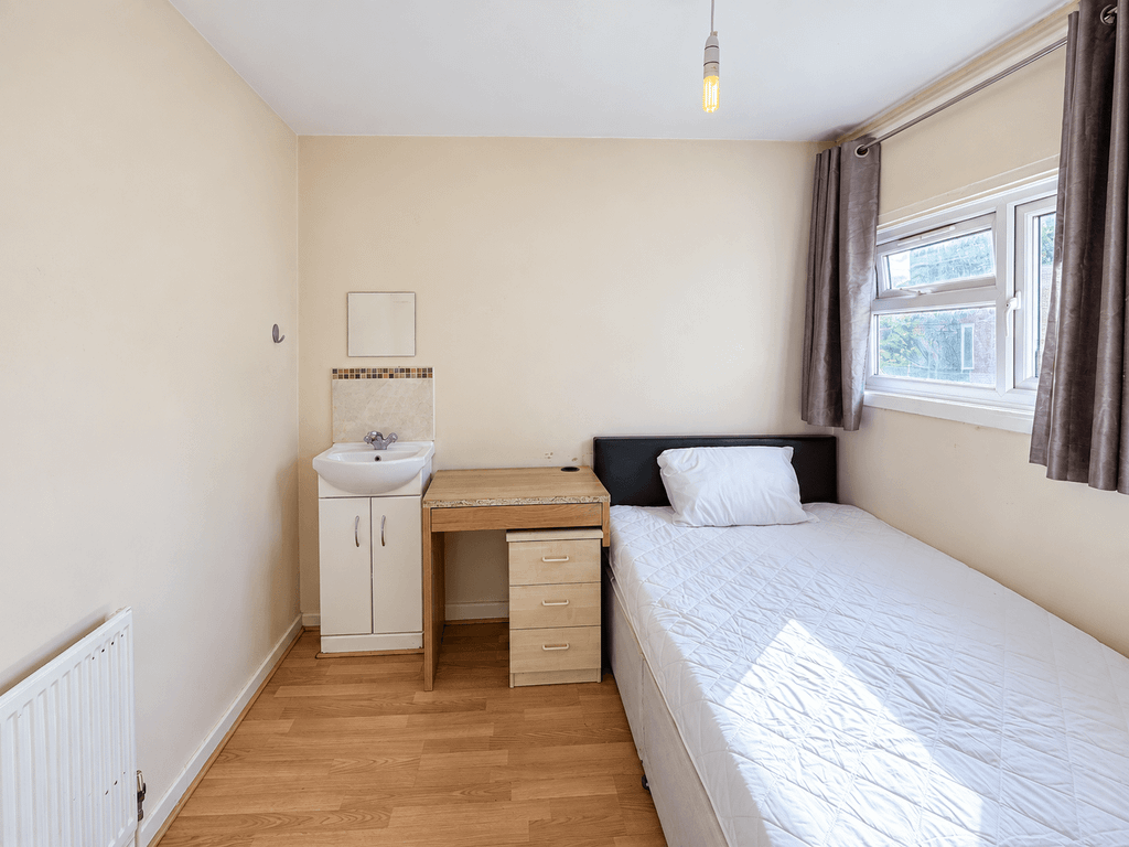 Property photo 2 of 7 Bright Compact Bedroom With Natural Sunlight
