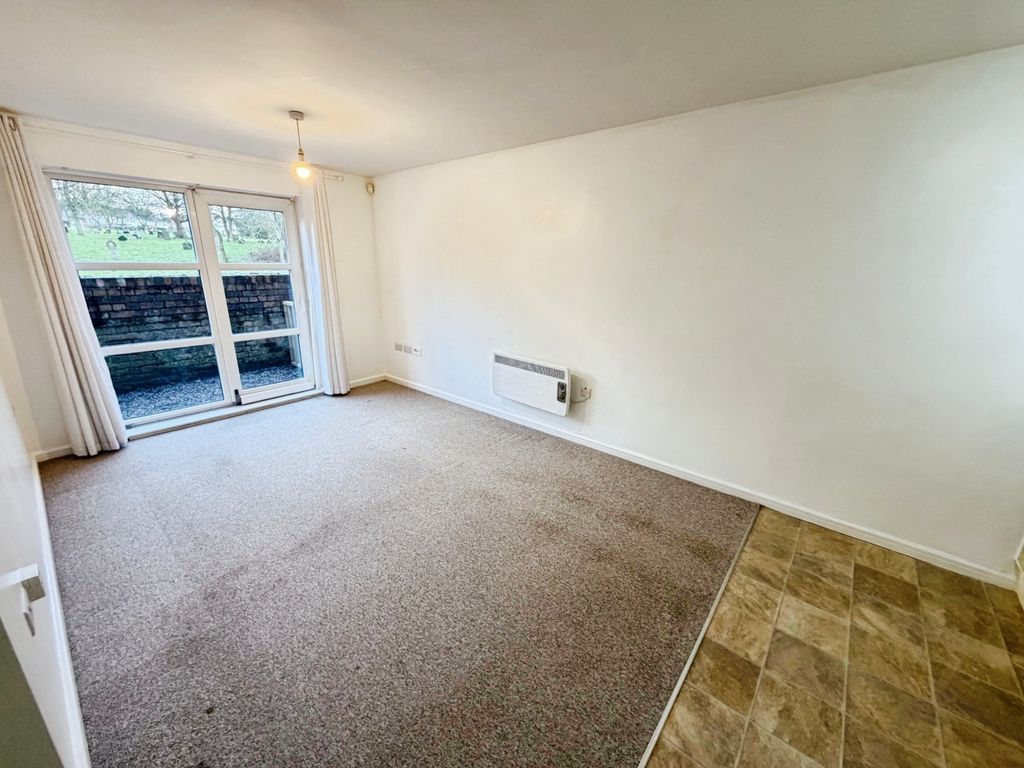 Property photo 2 of 10 Living Area