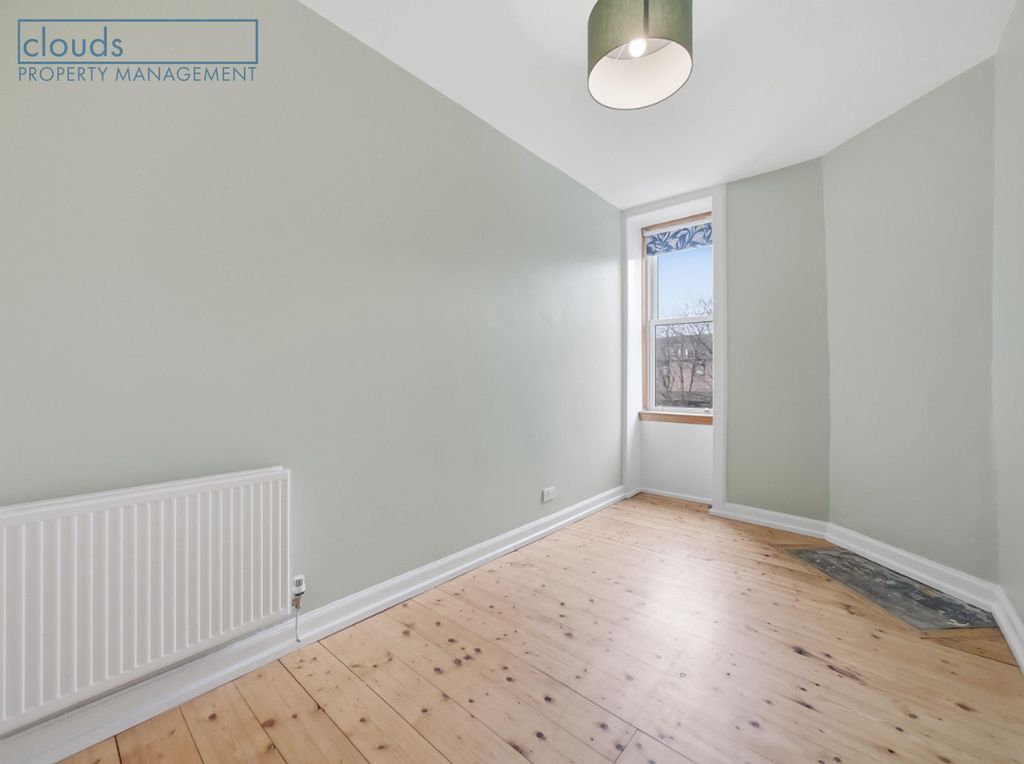 Property photo 3 of 13 Back Bedroom