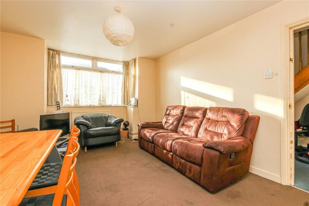 Property photo 2 of 14 A Cozy Living Room Featuring A Comfortable Brown l...