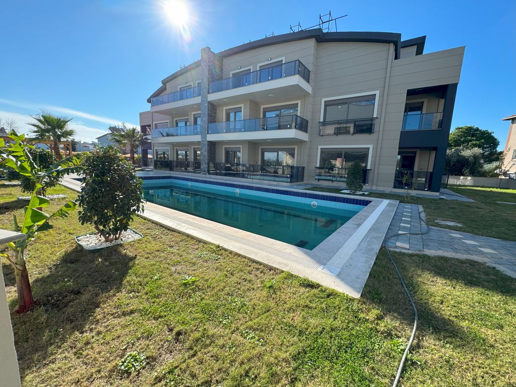 Property photo 3 of 20 Exceptional Belek Apartment In Antalya For Sale - View Of Gorgeous Apartment Block