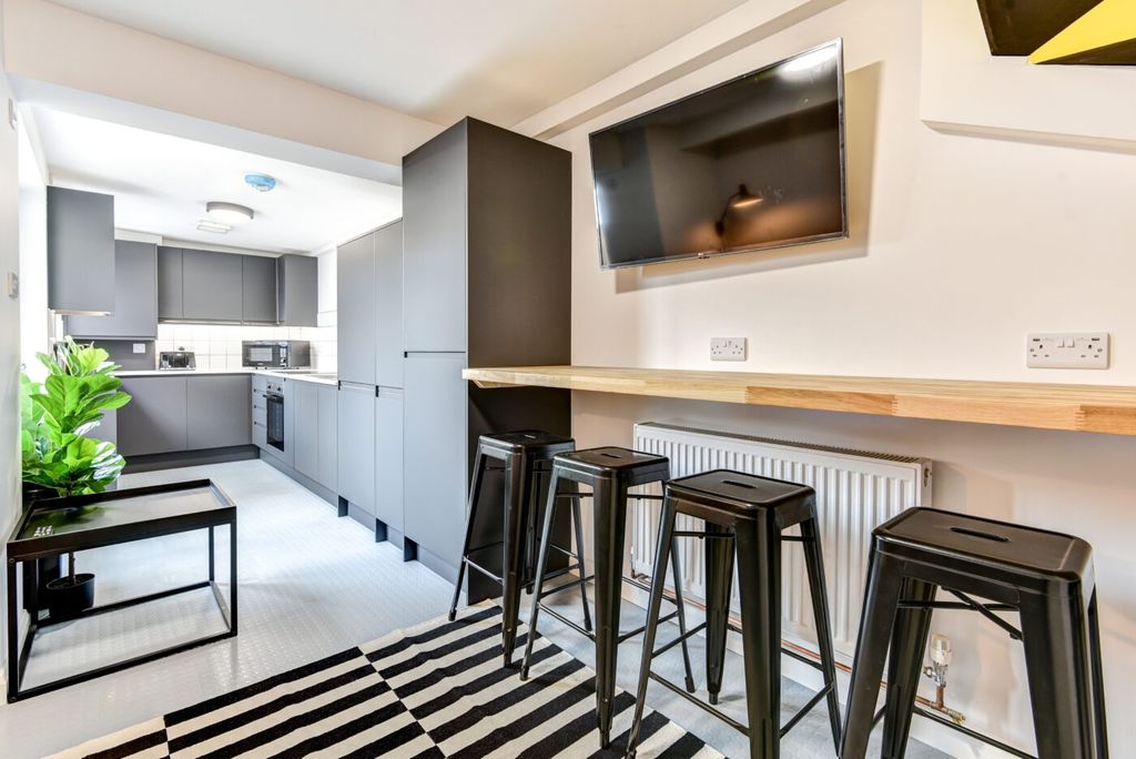 Property photo 2 of 5 Contemporary Galley Kitchen With Matte Grey Cabine...