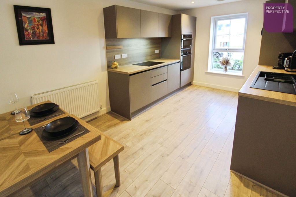 Property photo 3 of 13 Dining Kitchen