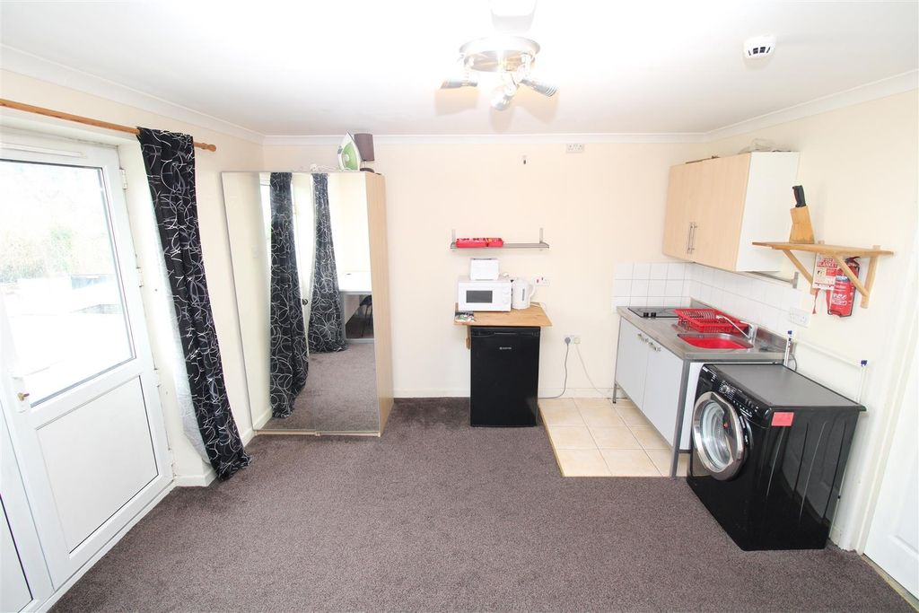 Property photo 2 of 4 Bright Functional Kitchen With Laundry Facilities...