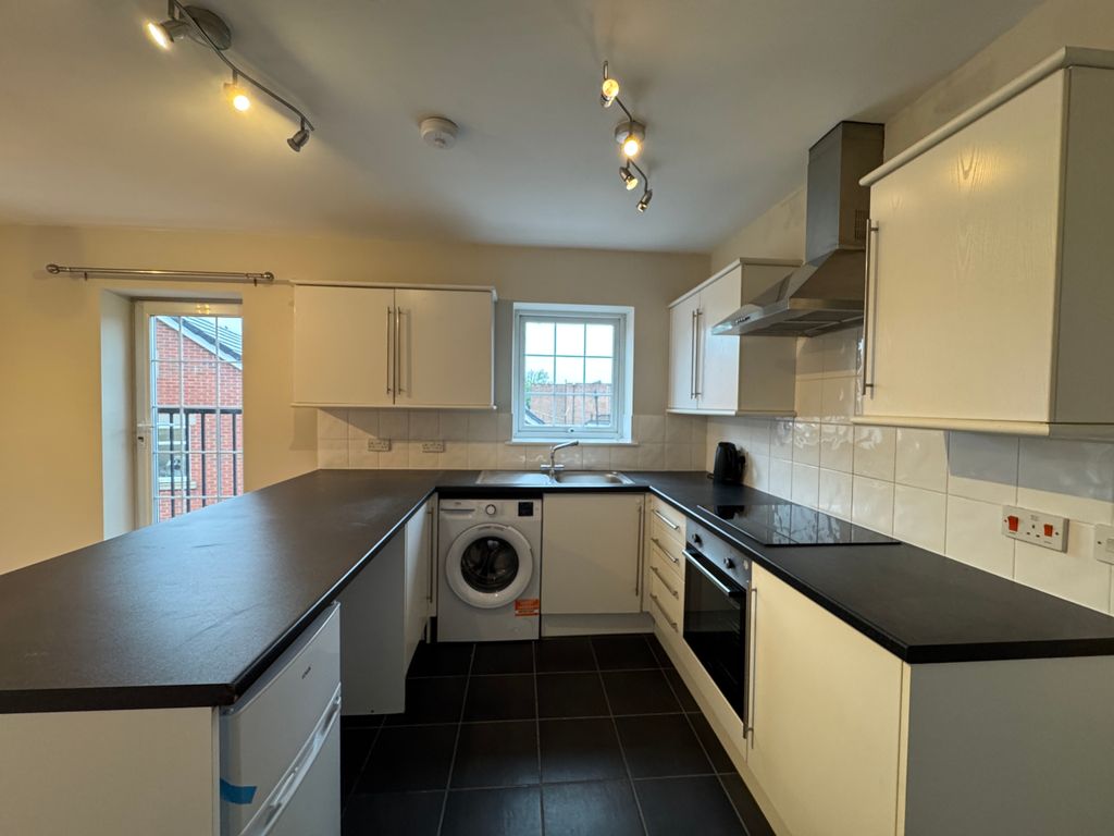 Property photo 3 of 7 Kitchen Area