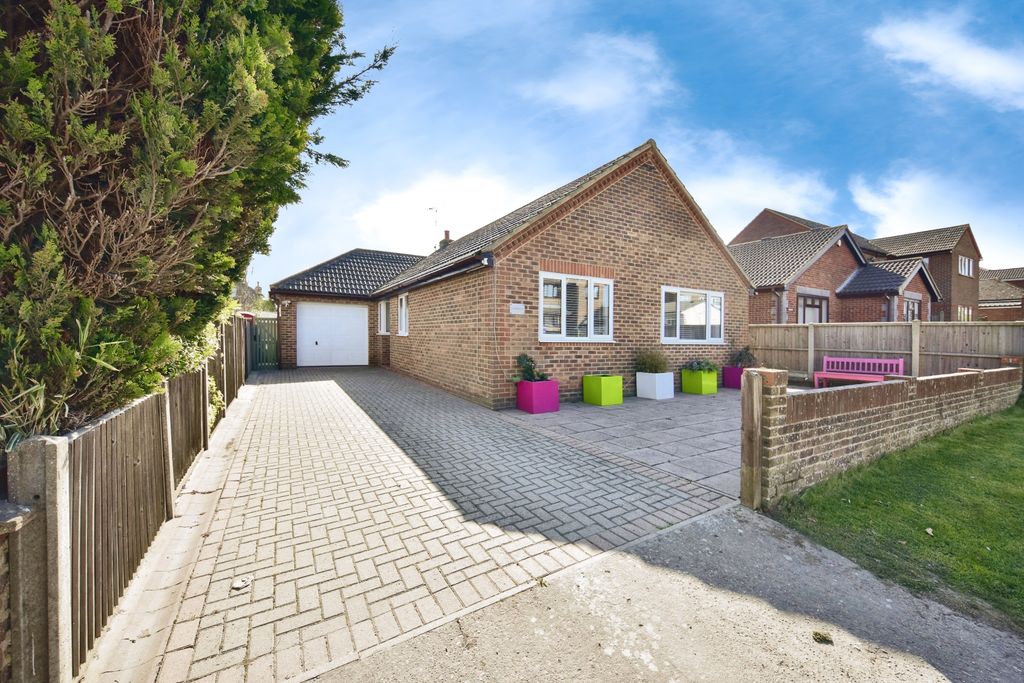 Property photo 2 of 20 Outside View Of The Property With Driveway Parking