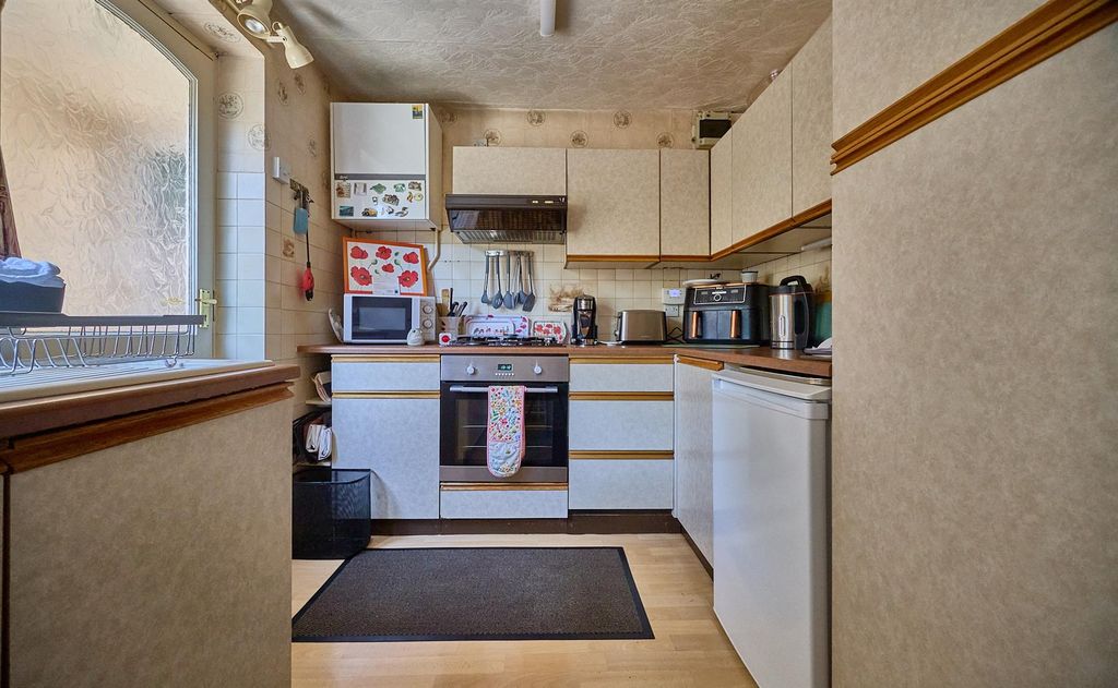 Property photo 3 of 13 Rear Kitchen
