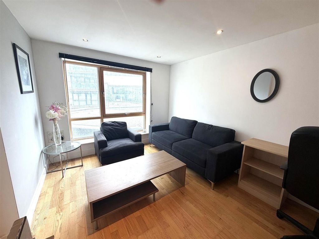 Property photo 1 of 9 Bright Modern Lounge With Large Window And Sofa...