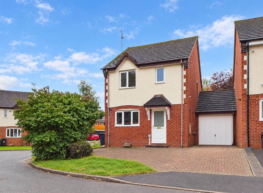 Property photo 1 of 21 Bright Suburban House Under Blue Skies.Png