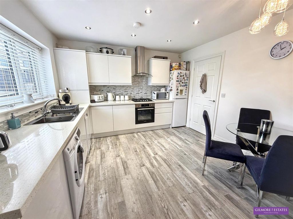 Property photo 3 of 13 Dining Kitchen