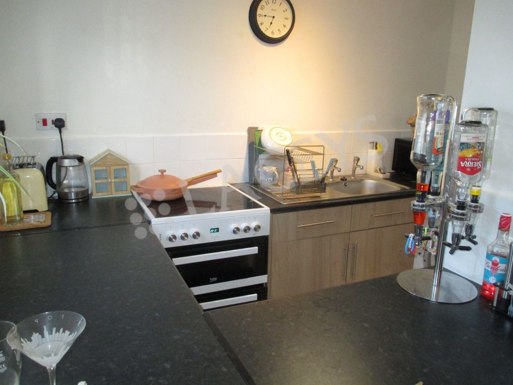 Property photo 3 of 6 Kitchen