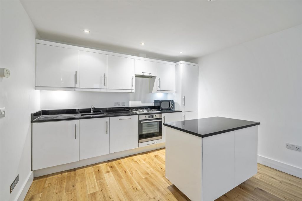 Property photo 3 of 12 Kitchen