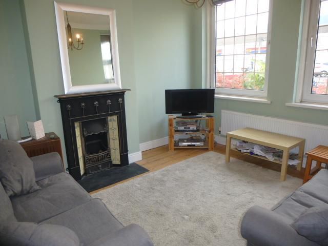 Property photo 2 of 8 Living Room