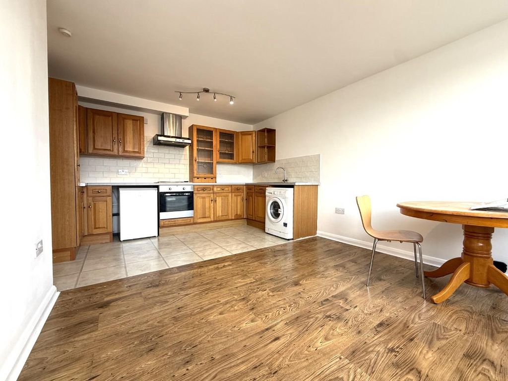 Property photo 1 of 8 Kitchen And Lounge Area