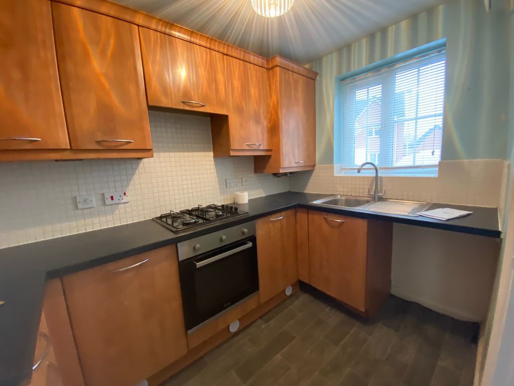 Property photo 3 of 7 Kitchen