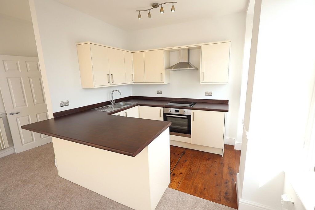Property photo 3 of 9 Kitchen Area
