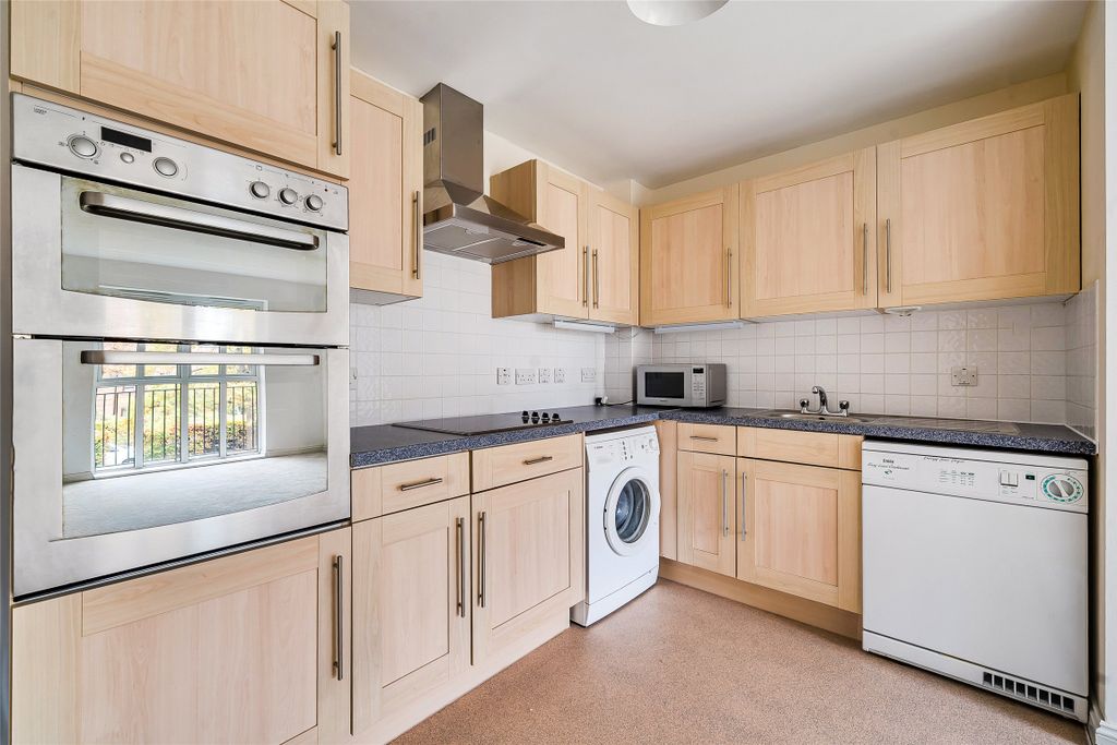 Property photo 3 of 12 Kitchen