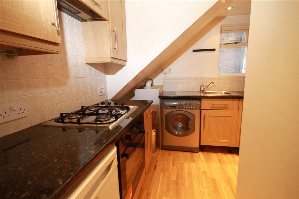 Property photo 3 of 8 Kitchen