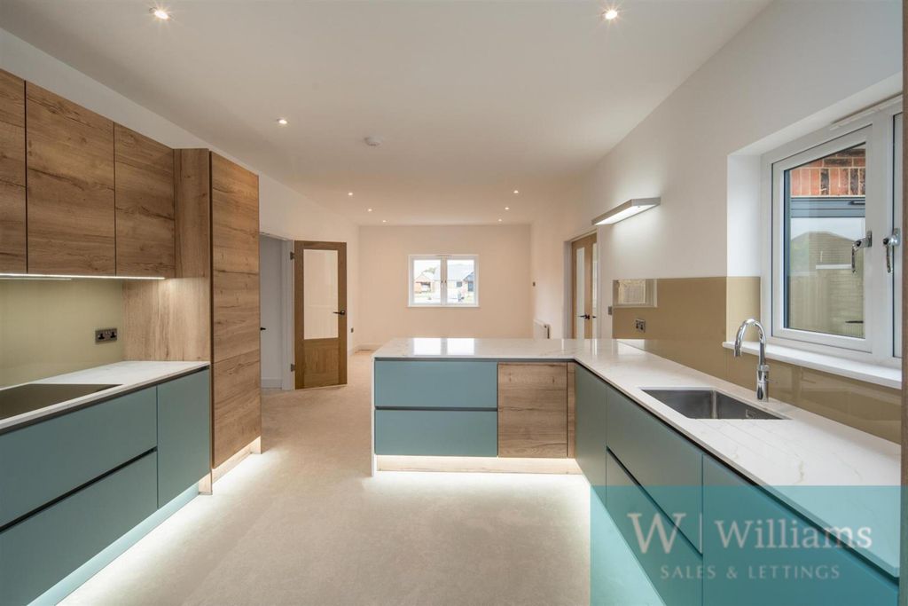 Property photo 3 of 12 Kitchen